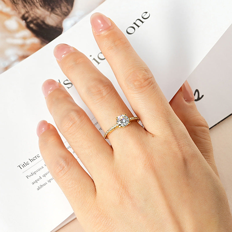 Fashionable, Light-luxury, Versatile, Niche Ring Featuring Faux Moissanite With A Four-prong Zircon Setting And Electroplated Finish